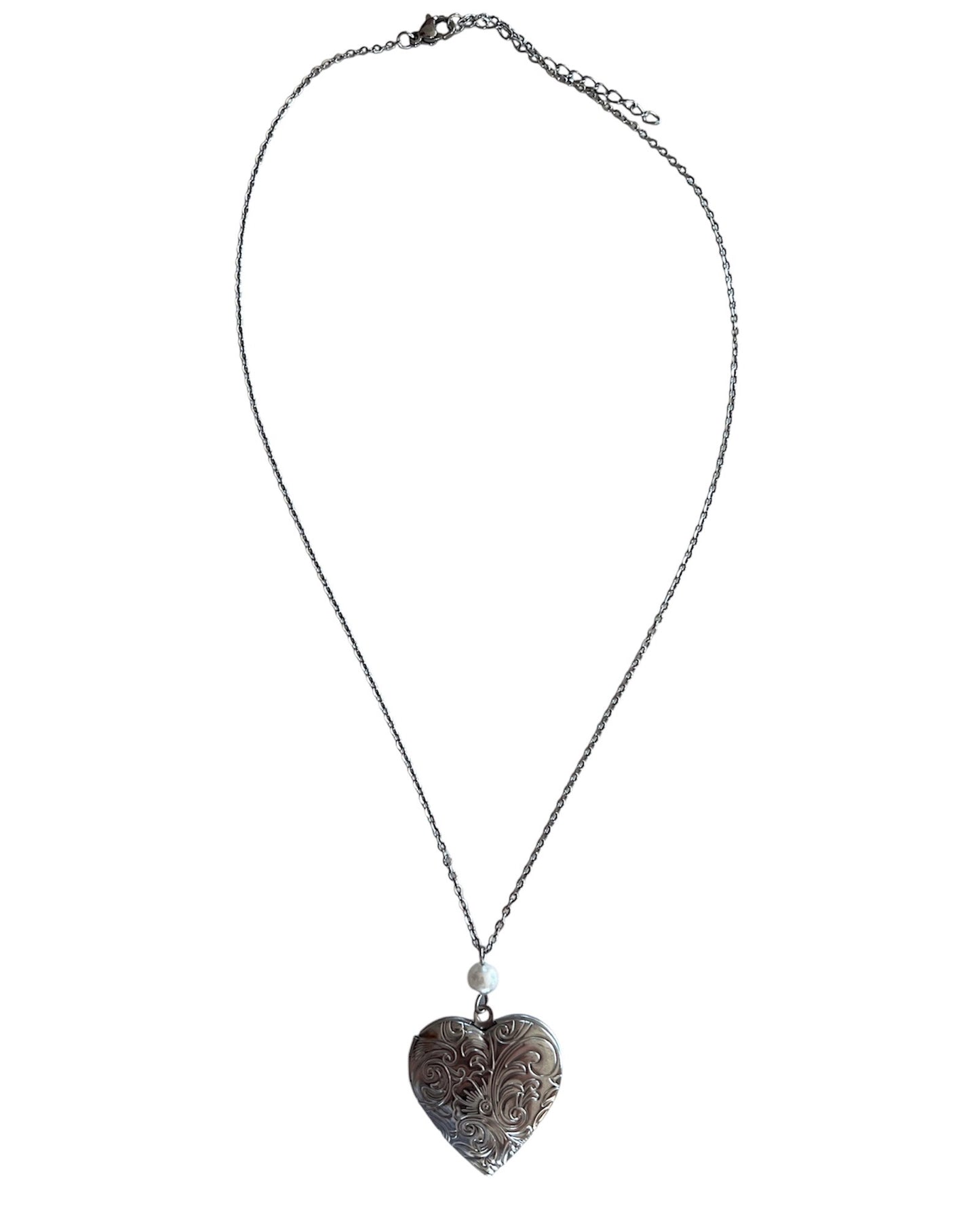 The Virgin Mary silver heart locket