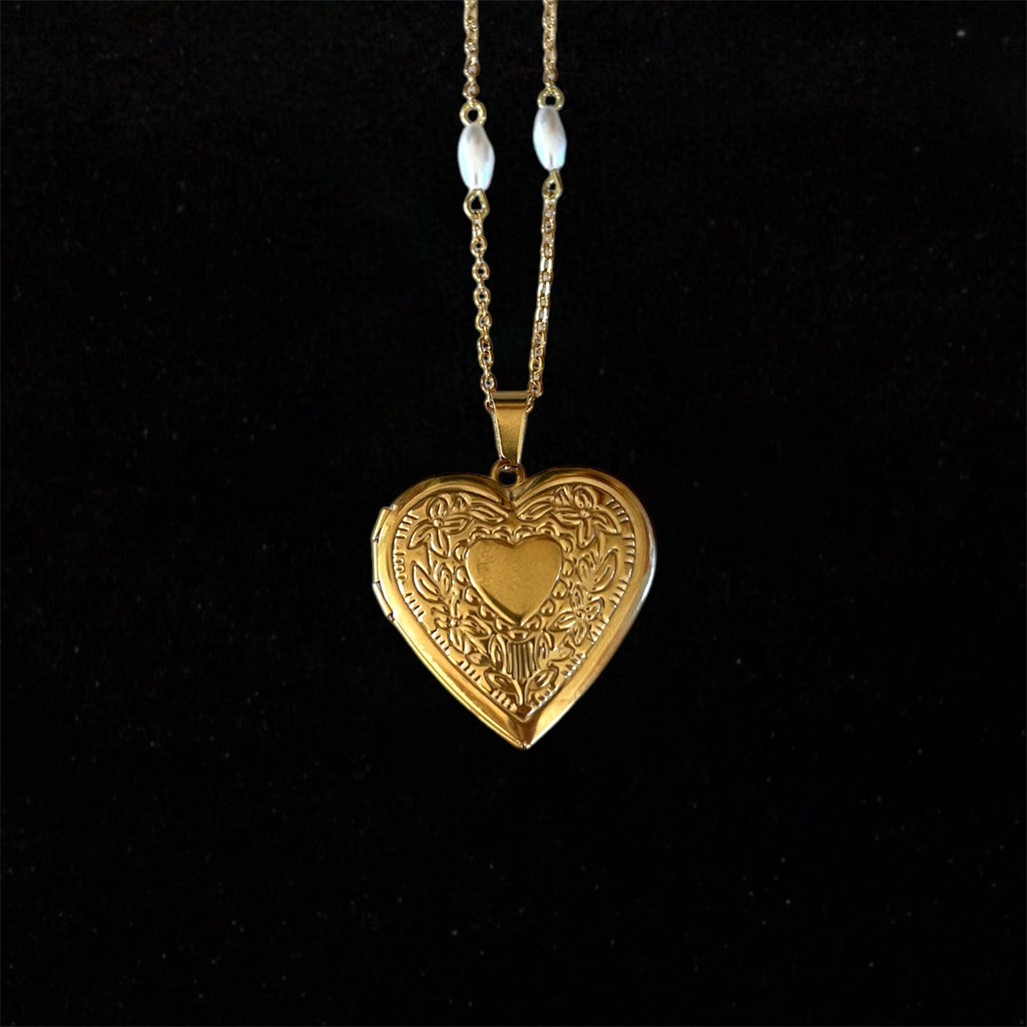 Gold heart locket necklace