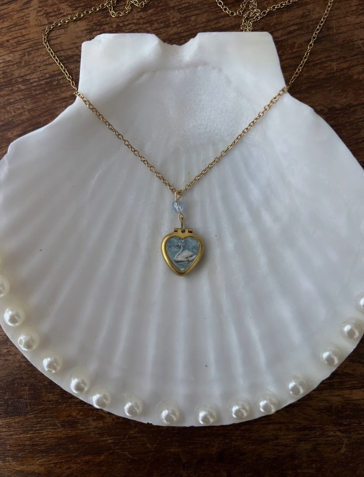 The Reverie Swan locket