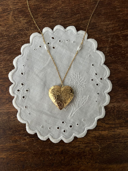 Gold heart locket necklace
