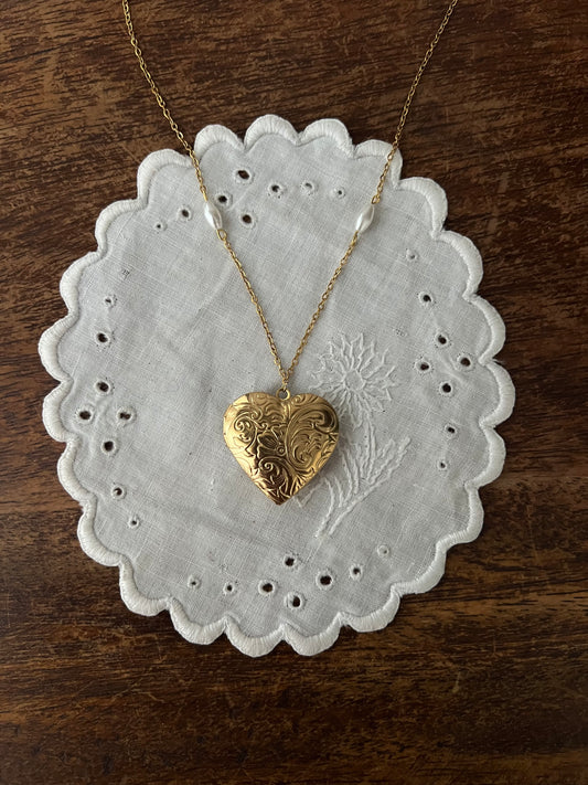 Gold heart locket necklace