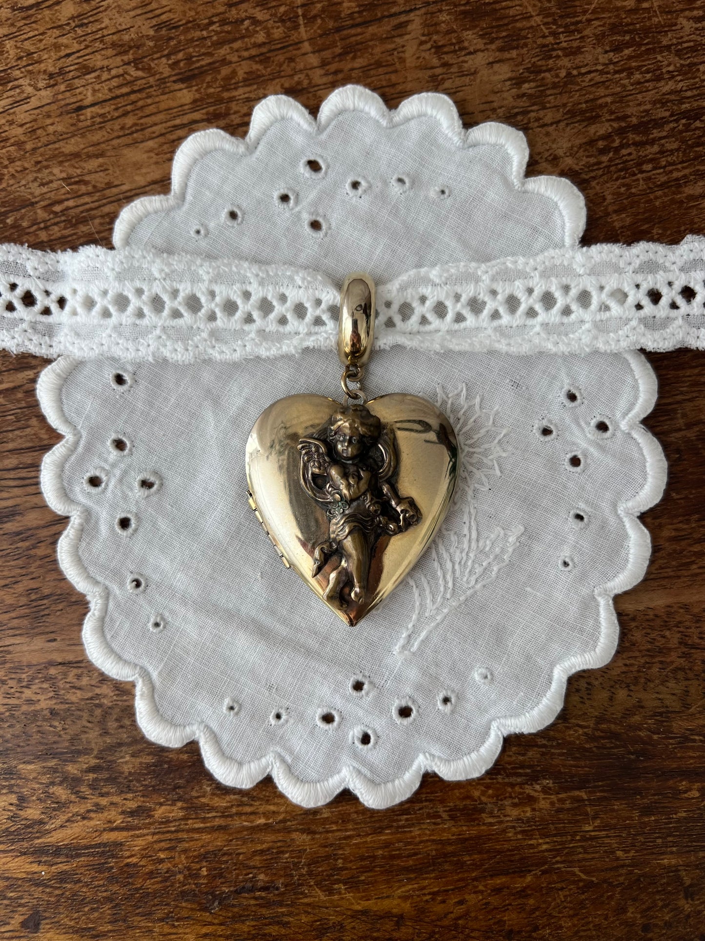 Cherub locket necklace